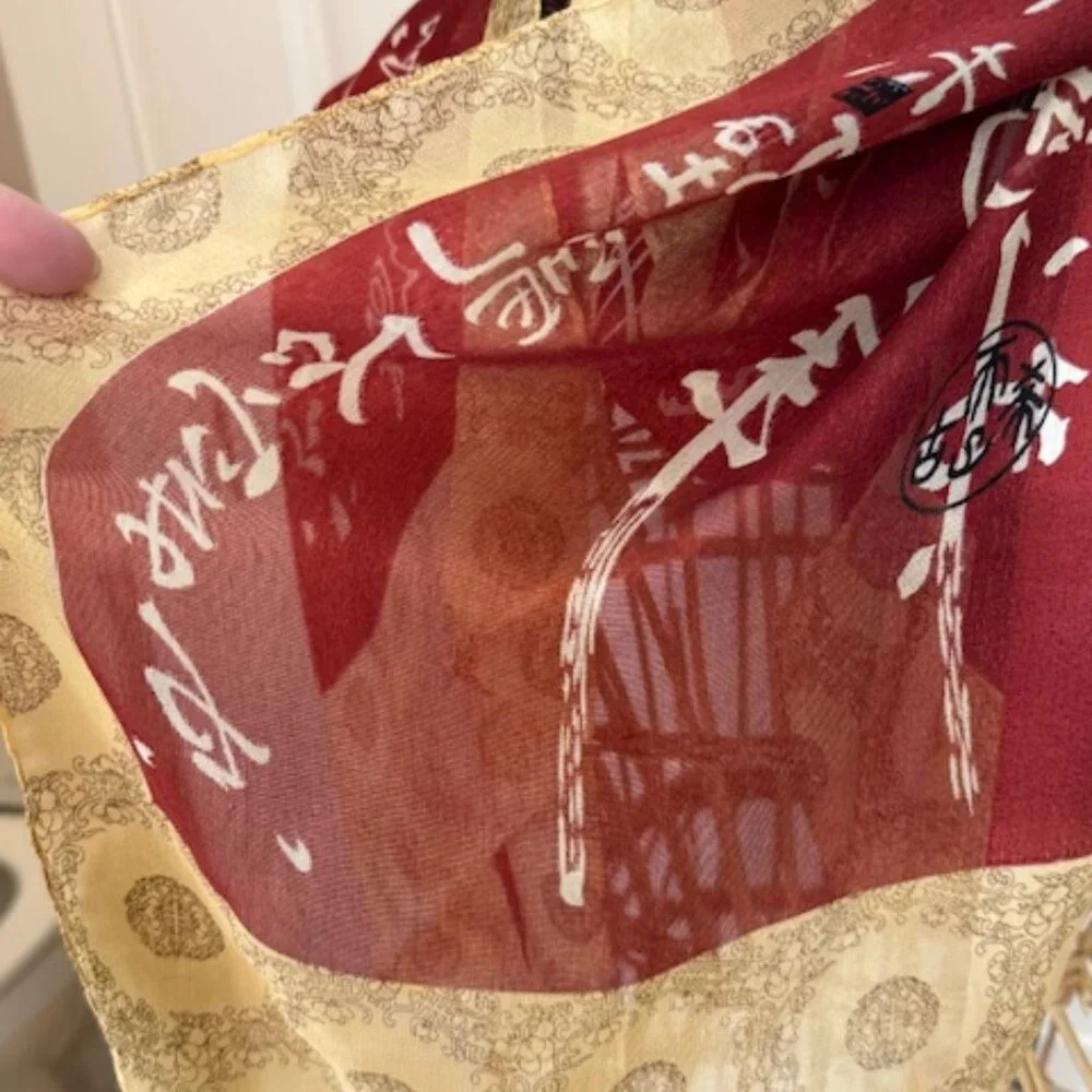 Vintage 100% silk rust and gold oblong scarf.